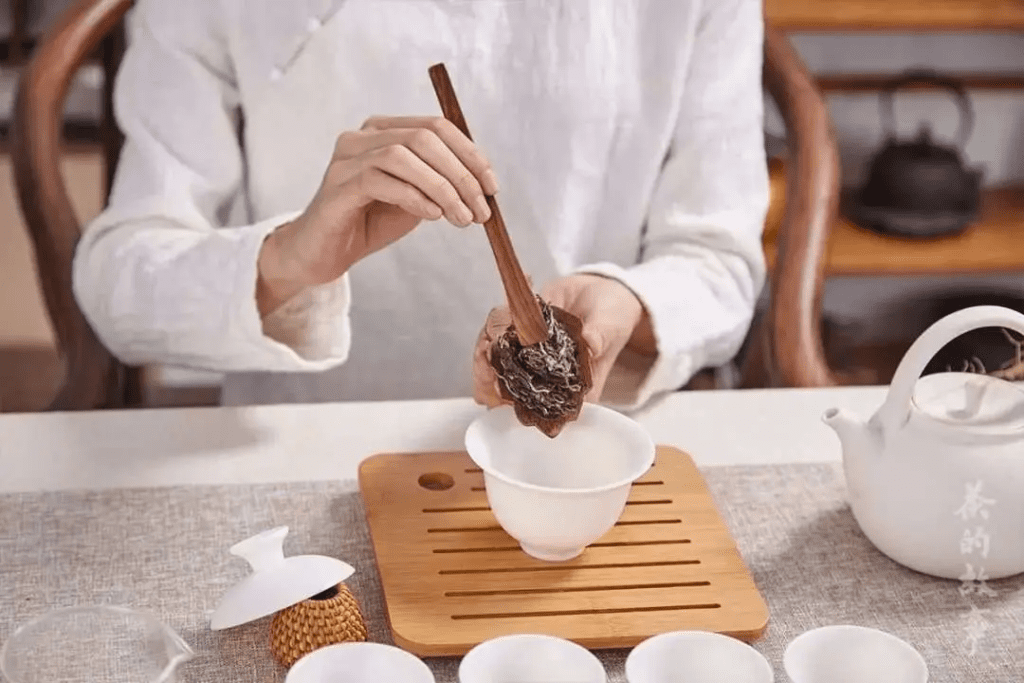Tea leaves added to a gaiwan before brewing