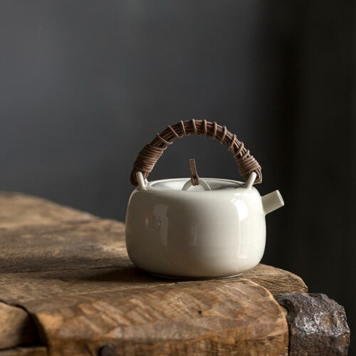 Rattan Handle Milky White Ceramic Kung Fu Teapot