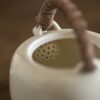 Rattan Handle Milky White Ceramic Kung Fu Teapot