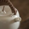 Rattan Handle Milky White Ceramic Kung Fu Teapot