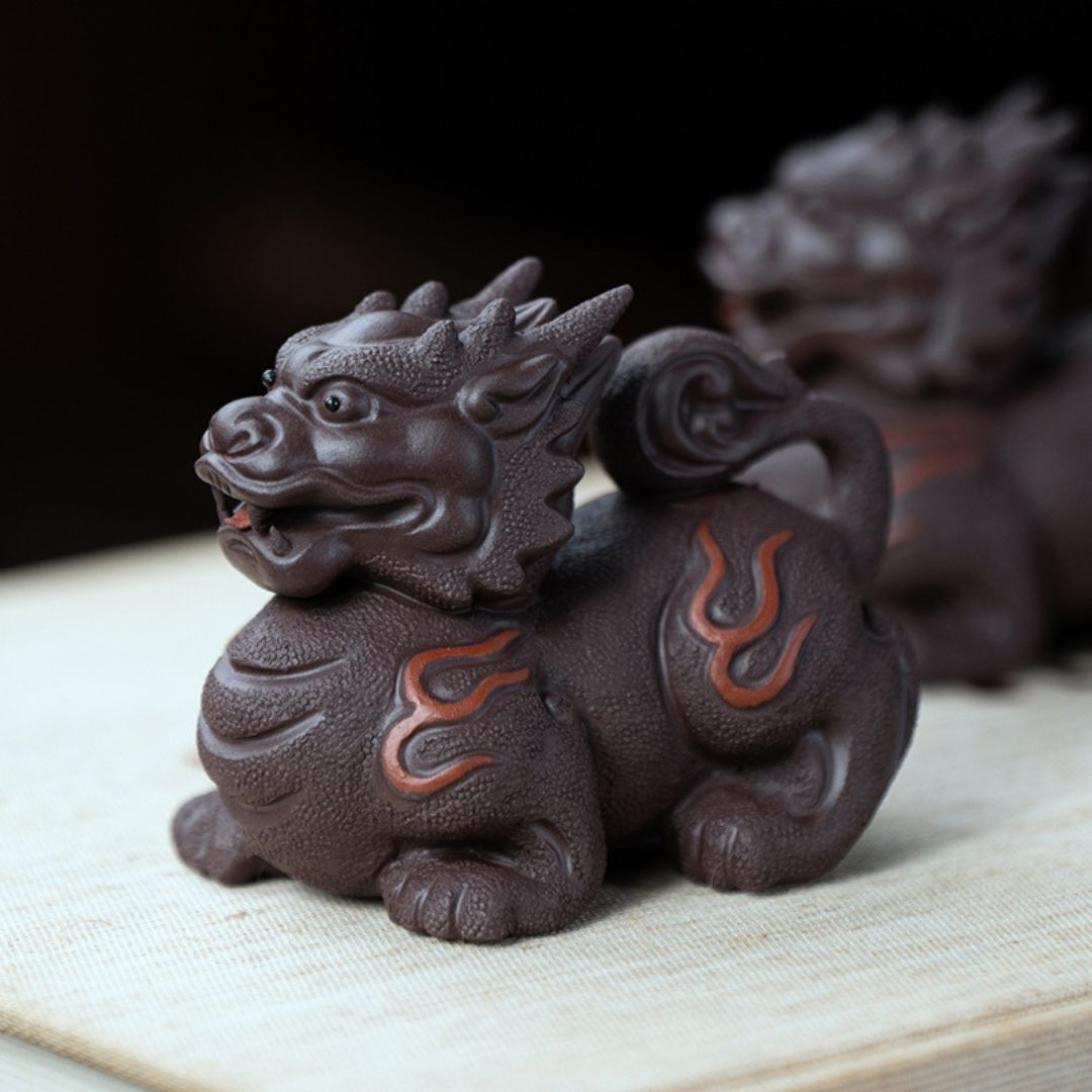 Zini clay Pixiu tea pet on a tea table