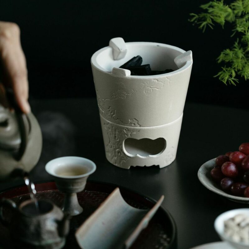 relief-sculpture-ceramic-lake-stone-winter-plums-tea-stove-3