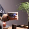 Fully Hand-painted Qinghua Ceramic Twined Lotus Two Lions 120ml Tea Cup