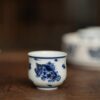 20241222_130841167_iOS Hand-painted Qinghua Ceramic Peach Blossom Fish 40ml Tea Cup