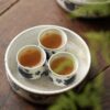 20241222_130841583_iOS Hand-painted Qinghua Ceramic Peach Blossom Fish 40ml Tea Cup