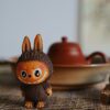 7ee3f8431cc99eeeb1b9c12b413c82b Handmade Zisha Yixing Clay Little Fluffy Monster Tea Pet