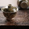 Hand-painted Qinghua Underglaze Golden Ceramic Twined Lotus 130ml Gaiwan4 Hand-painted Qinghua Underglaze Golden Ceramic Twined Lotus 130ml Gaiwan Set