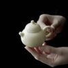 Elegant Ceramic Yellowish White 100ml Chinese Teapot1 Elegant Ceramic Yellowish White 100ml Chinese Teapot