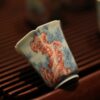 Hand-painted Qinghua Underglaze Red Ceramic 60ml Lake Stone Aroma Cup Tea Cup