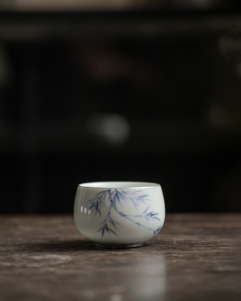 Qinghua 120ml Host Tea Cup with Silver Rim – Plum, Orchid, Bamboo & Pine2 Qinghua 120ml Host Tea Cup with Silver Rim – Plum, Orchid, Bamboo & Pine