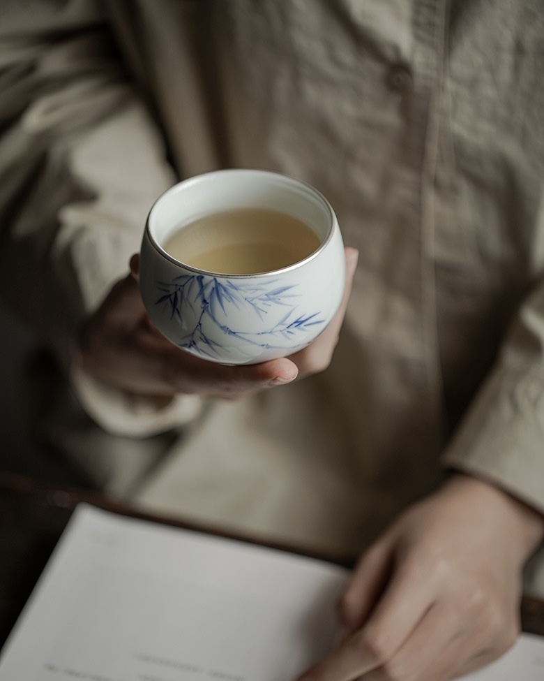 Qinghua 120ml Host Tea Cup with Silver Rim – Plum, Orchid, Bamboo & Pine3 Qinghua 120ml Host Tea Cup with Silver Rim – Plum, Orchid, Bamboo & Pine