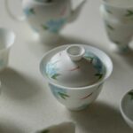 Hand-painted White Porcelain Flower & Swimming Fish 80ml Gaiwan