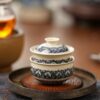 Handmade-Hand-painted-Porcelain-Blue-White-Baoxiang-Pattern-65ml-Gaiwan-Set-Pre-Order-Ship-In-20-Days4 Handmade Hand-painted Porcelain Blue & White Baoxiang Pattern 65ml Gaiwan Set Pre Order Ship In 20 Days