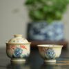 Hand-painted Qinghua Underglaze Red Porcelain Jie Zi Shu Calligraphy Bamboo and Rock 65ml Gaiwan Set