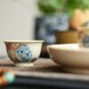 Hand-painted Qinghua Underglaze Red Porcelain Jie Zi Shu Calligraphy Bamboo and Rock 65ml Gaiwan Set