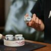 Hand-painted Qinghua Porcelain Bamboo and Butterfly 25ml Tea Cup