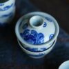 Hand-painted-Qinghua-Wood-kiln-Fired-Porcelain-Crab-Gaiwan-Set8 طقم غايوان على شكل سرطان البحر من البورسلين المطلي يدويًّا والمُصنَّع في فرن الخشب بجامعة تشينغهوا